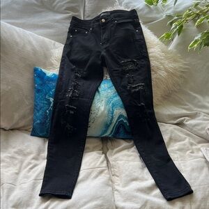 AMIRI Black Distressed Skinny Jeans